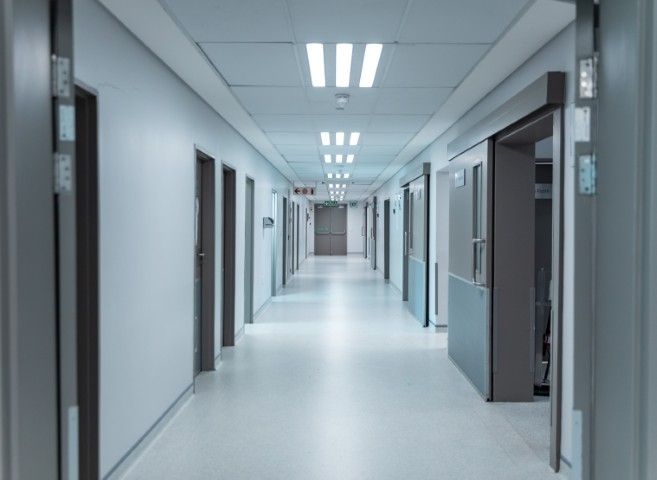 A healthcare facility, empty corridor
